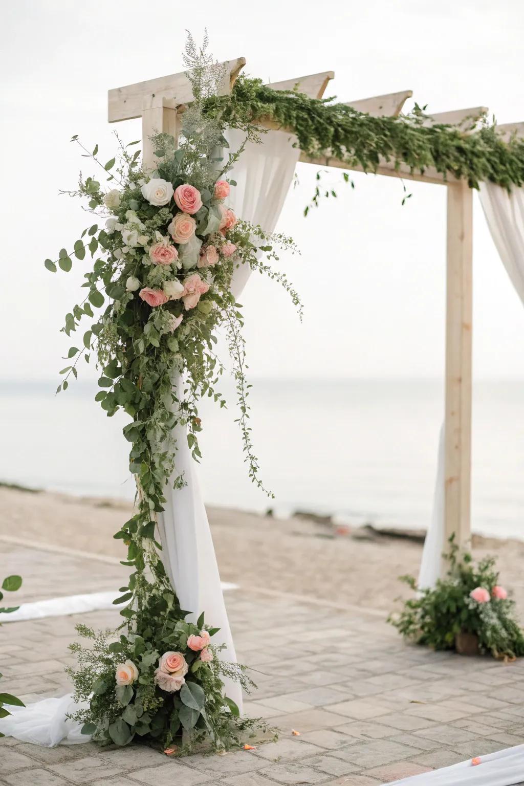 A basic arch with greenery and flowers beautifully frames the ceremony.