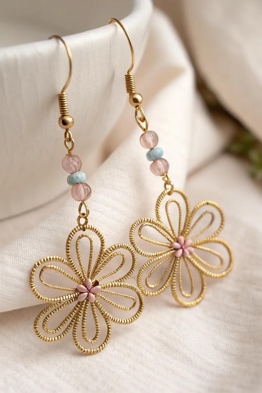 Greet the spring season with these superb floral wire earrings, the ultimate mix of understated elegance and bohemian magnetism.