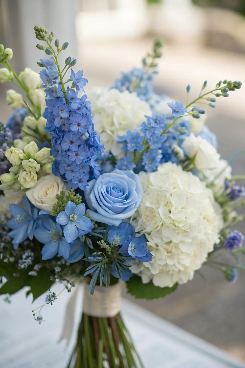 Exquisite blue floral arrangements introducing a natural element to the party.