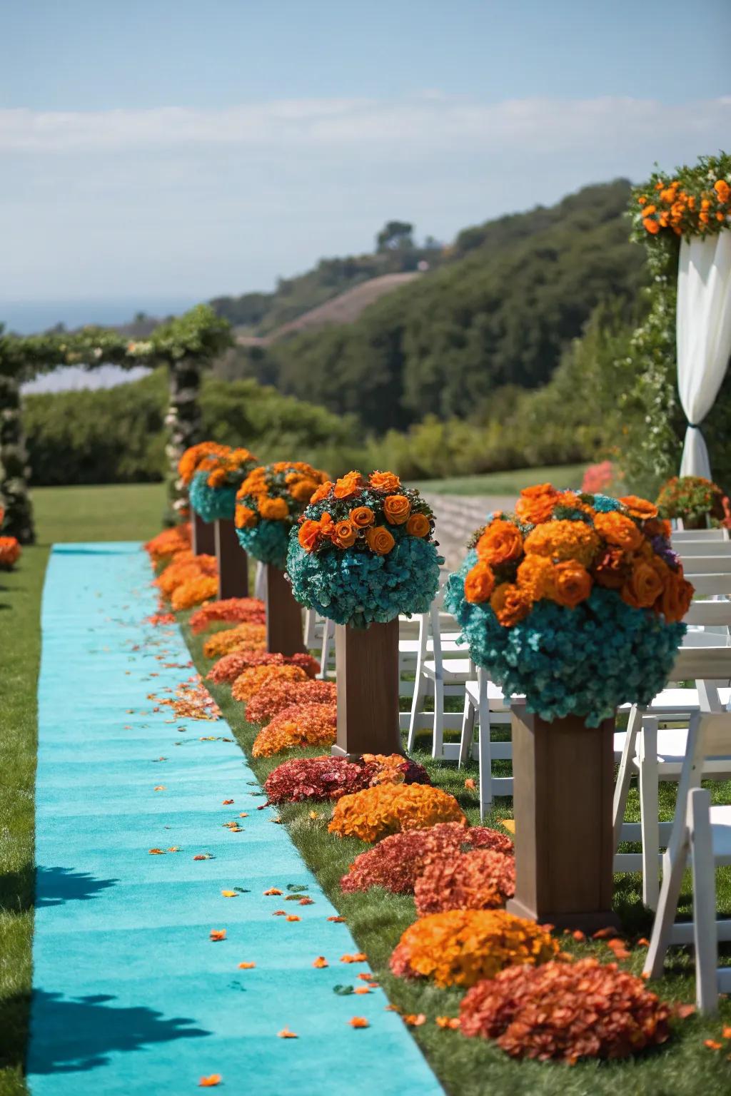 A celebration walkway adorned with cerulean and rust orange flowers.