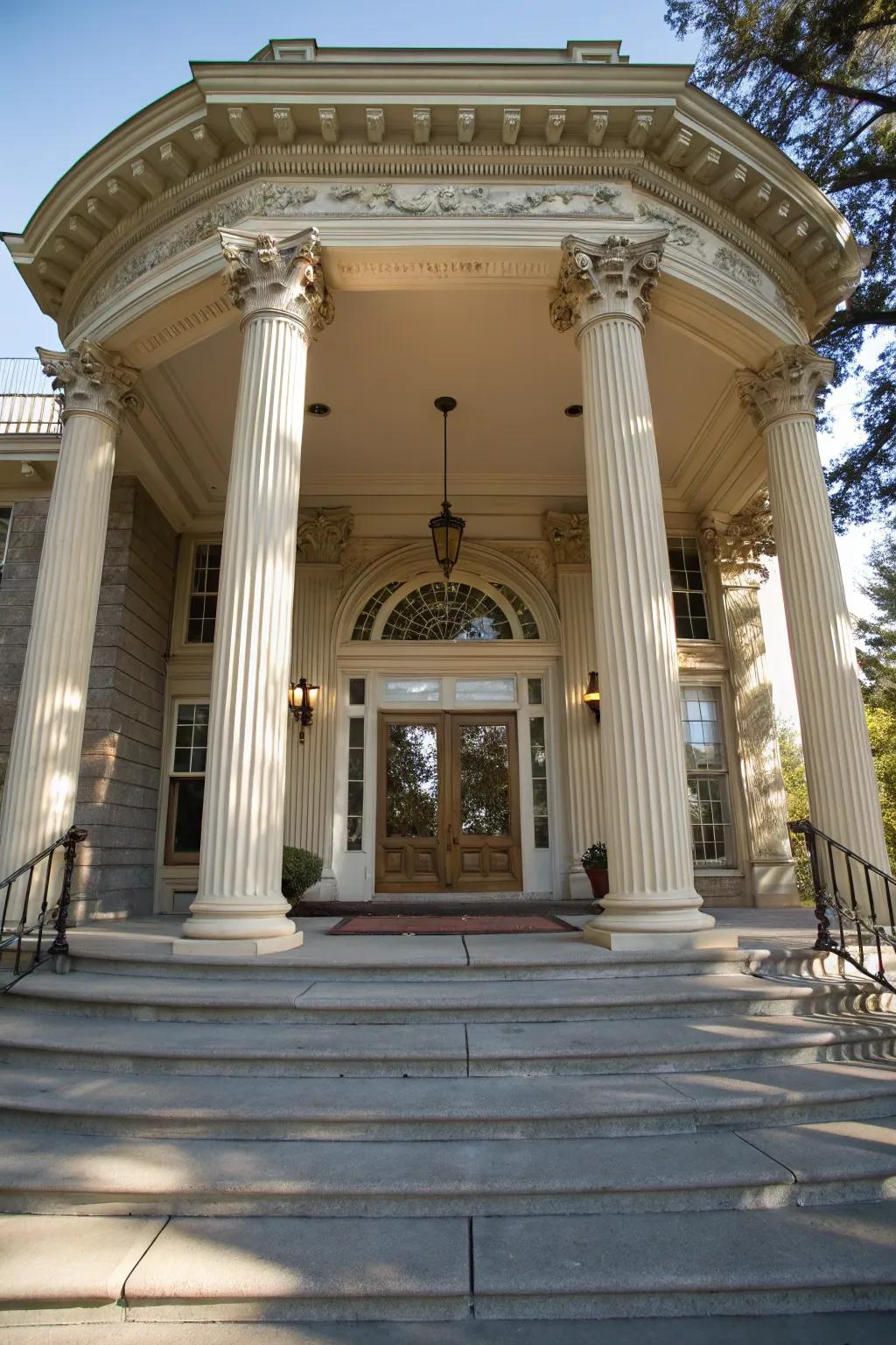 An elegant columned porch adds elegance to the entranceway.