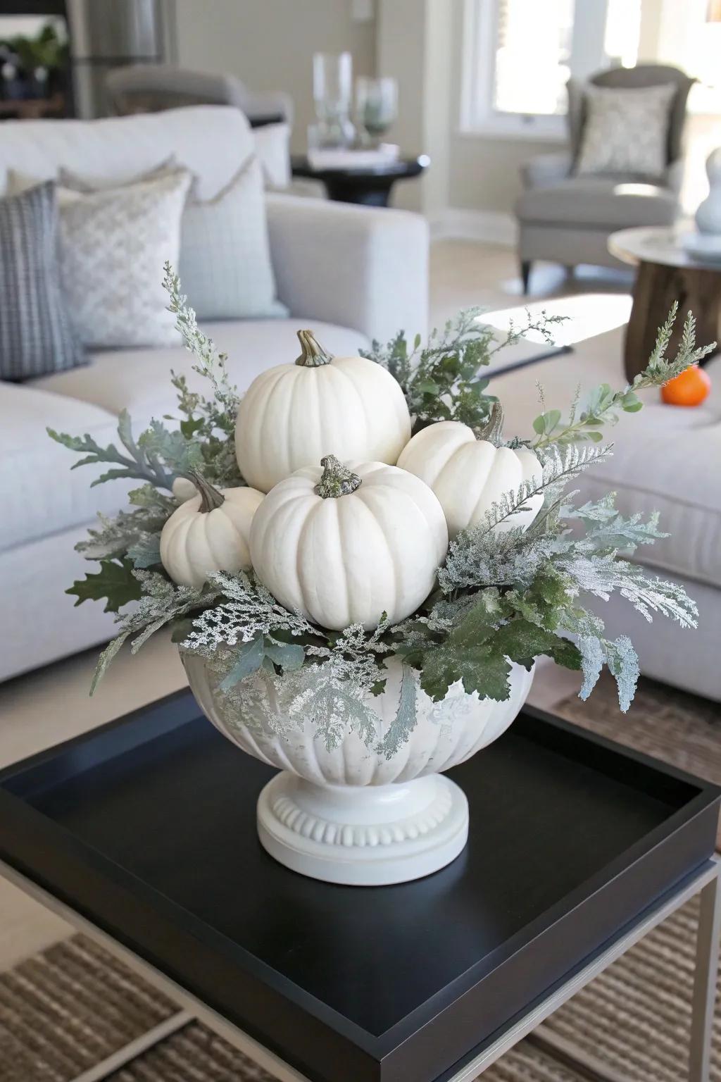 Elegant ivory squashes in a minimalist fall container.