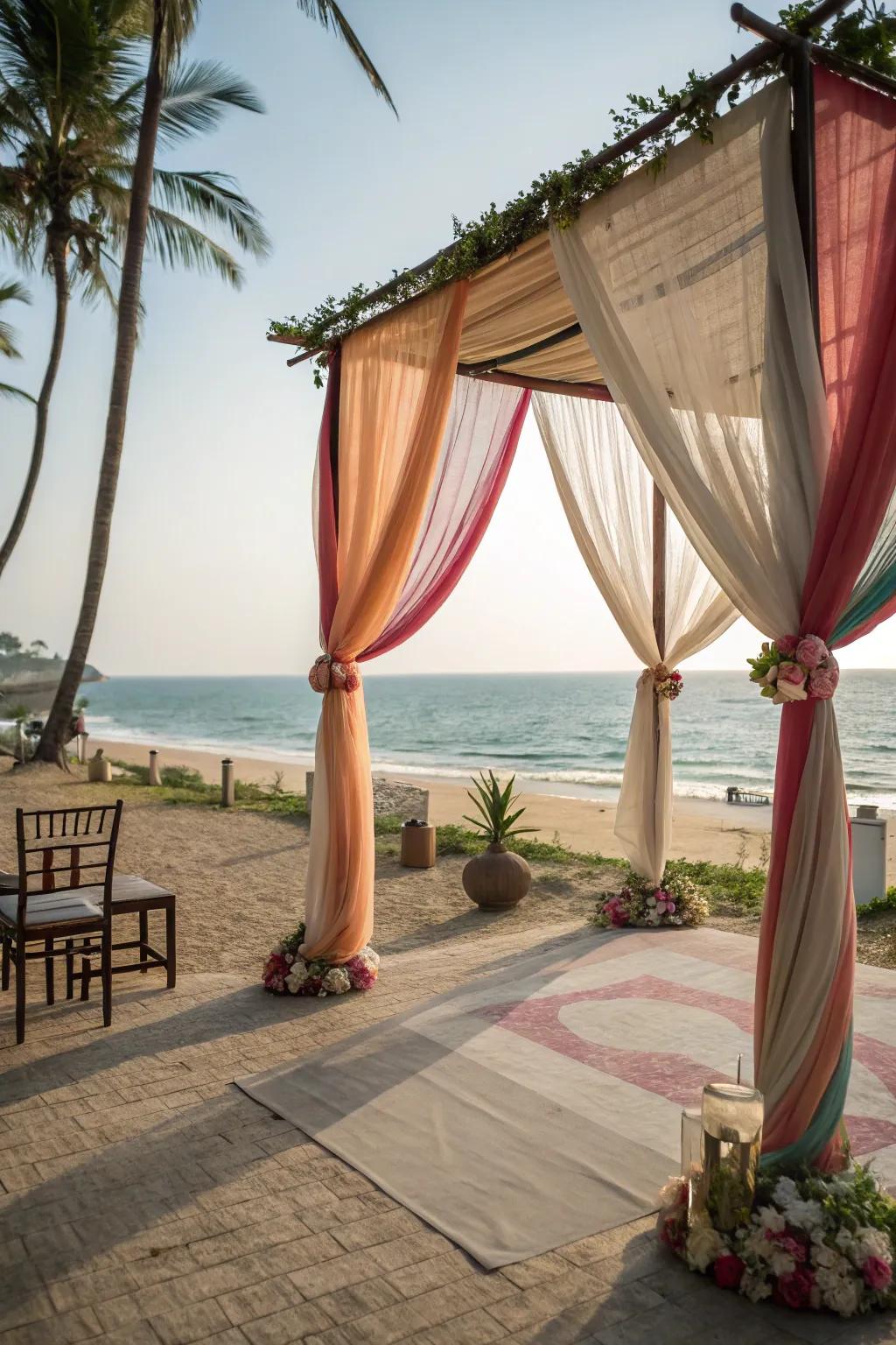 A shore mandap featuring flowing fabrics fashions a tranquil coastal vibe.