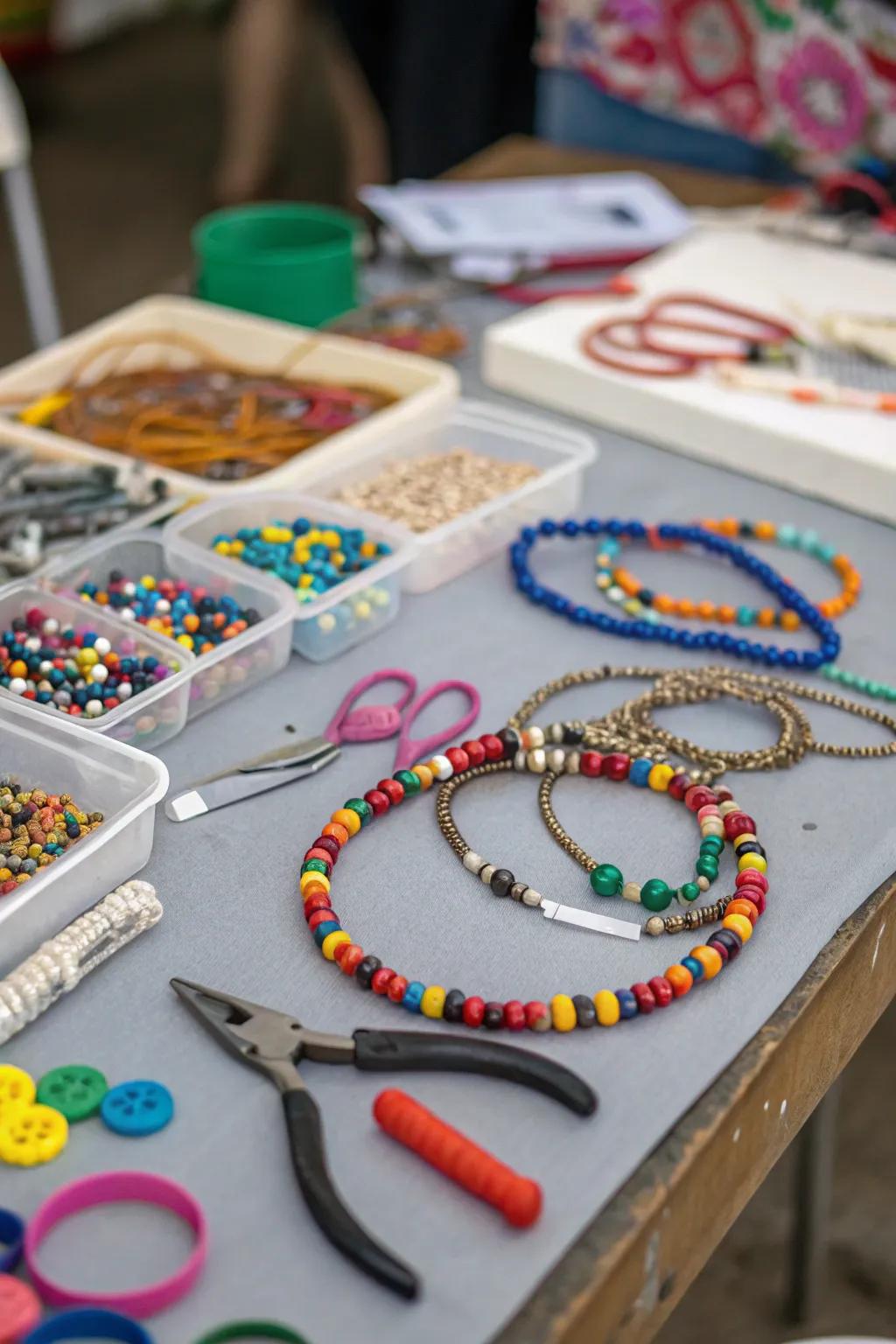 A bead-making station gives guests a creative activity and a party keepsake