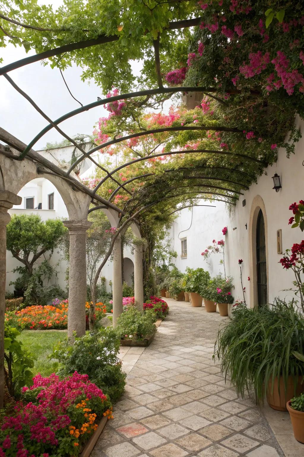 Curved pergolas featuring flowering vines deliver shade and beauty.