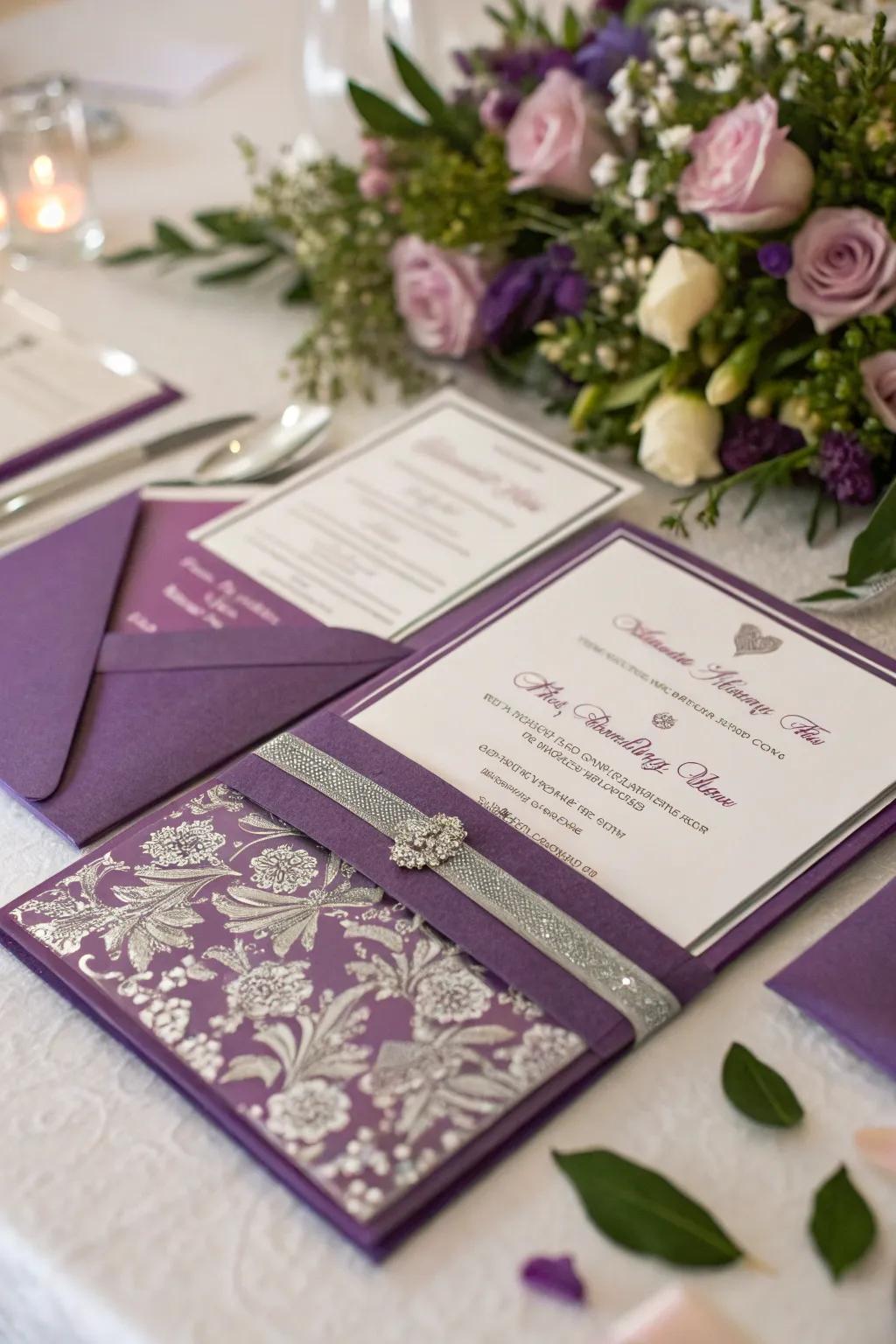 Purple and silver invitations set the stage for a refined wedding.