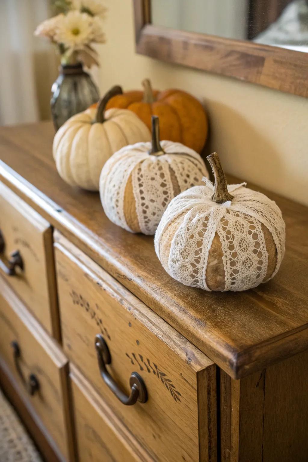 Lace-draped pumpkins emanate classic charm and refinement.