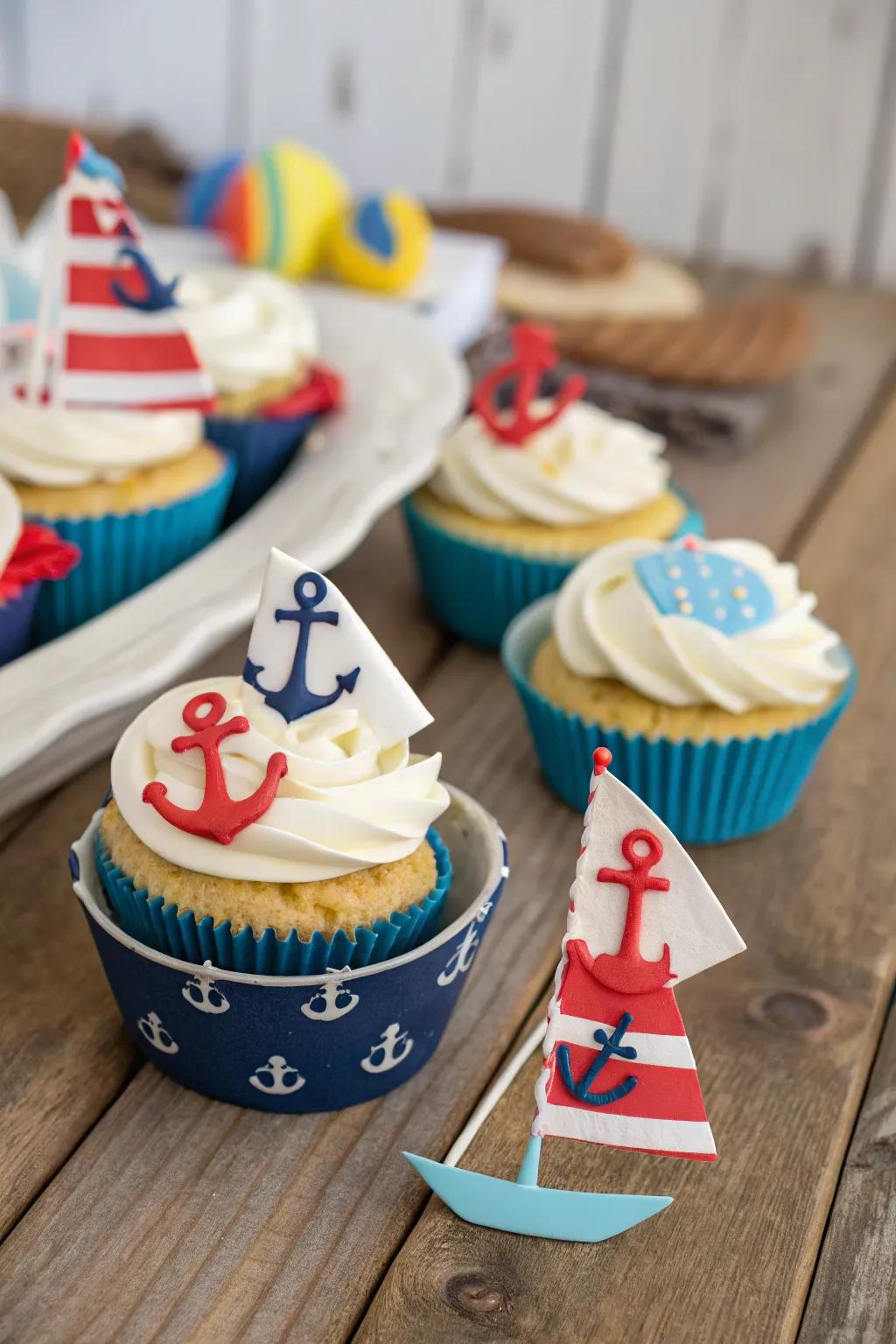 Seafaring-themed cupcakes establish the scene for a maritime celebration.