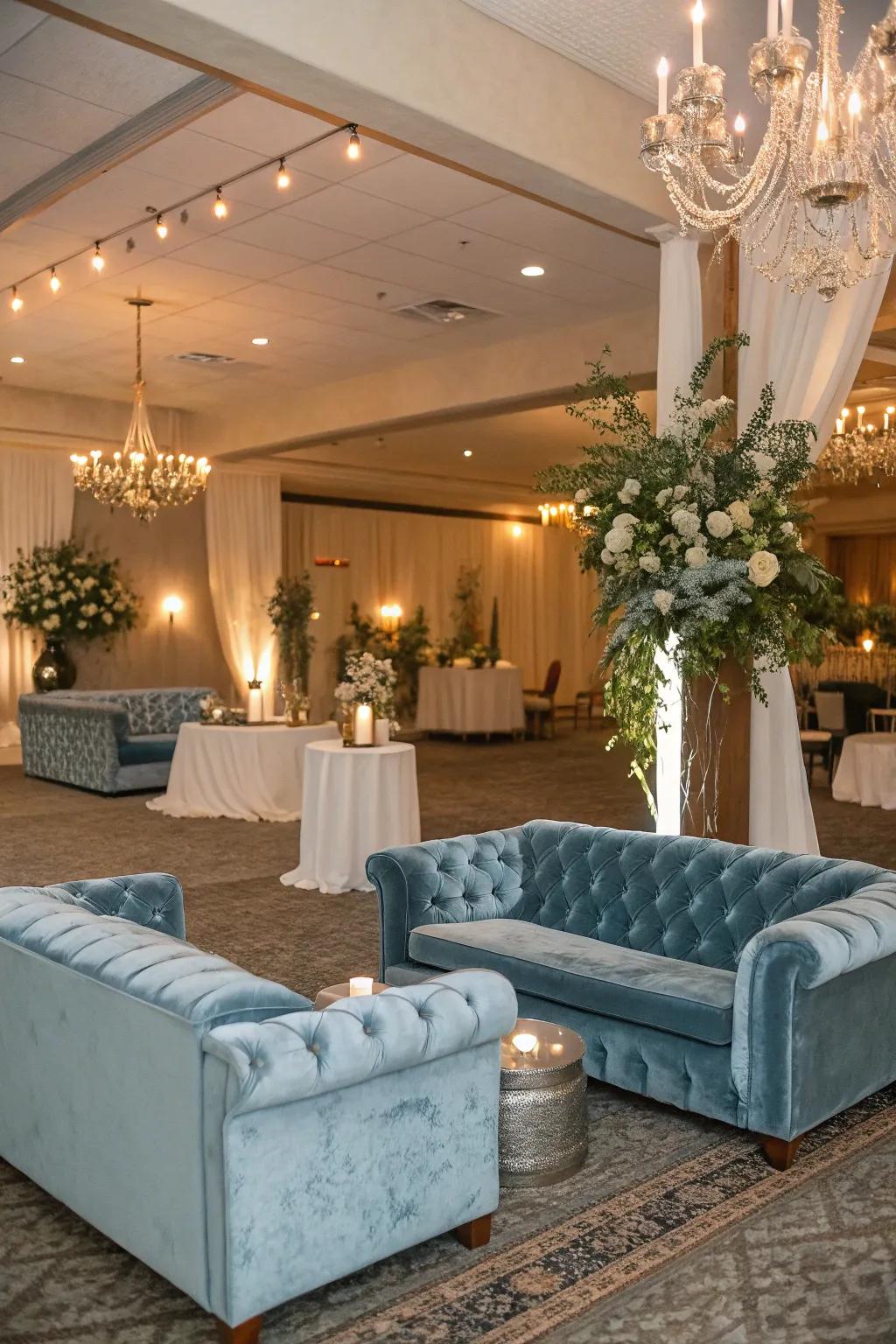 A plush lounge spot presenting misty blue plush seating, welcoming attendees to unwind and revel in the celebration.