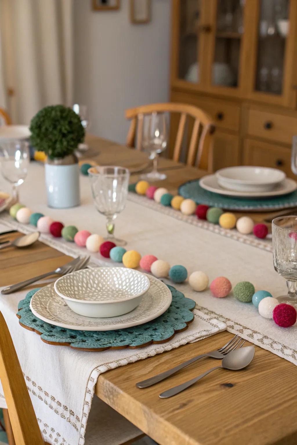 Felt garlands used as table runners create a striking focal point for meals.