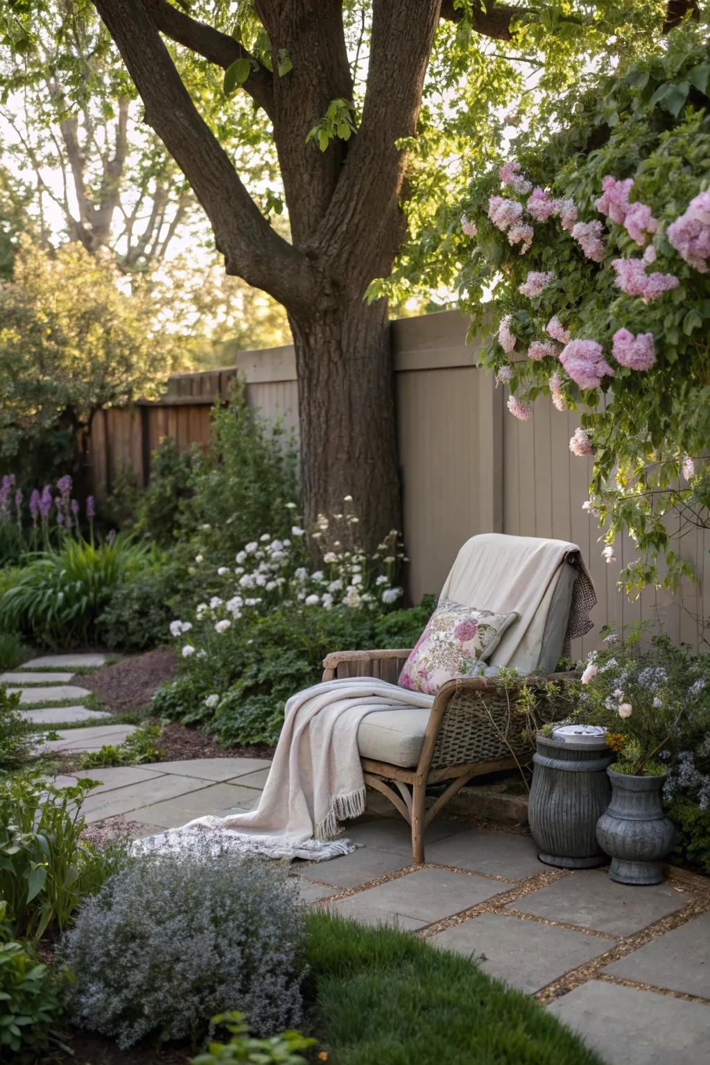 A cozy garden nook has a tree as a peaceful backdrop.