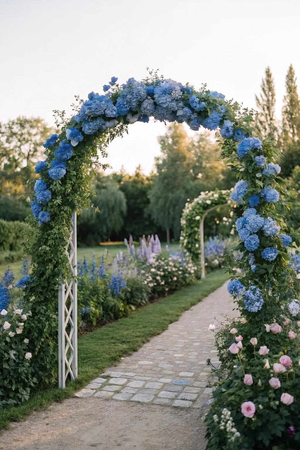 A dreamy wedding arch adorned with blue larkspurs.