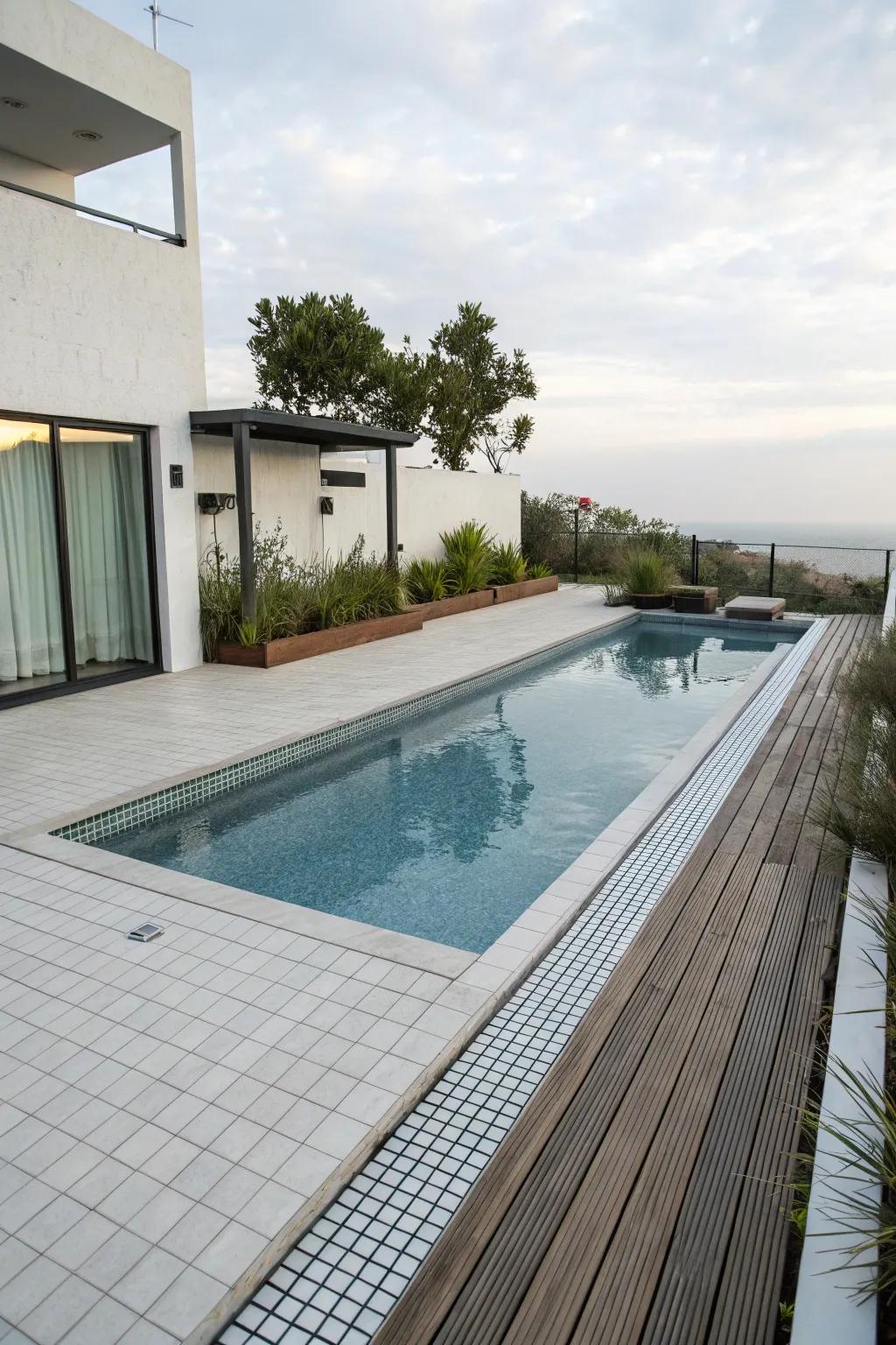 Spare tiling delivers a polished and current pool layout.