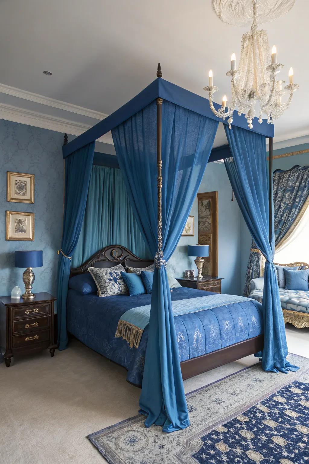 A covered bed introduces drama and timeless beauty to the sapphire blue space.