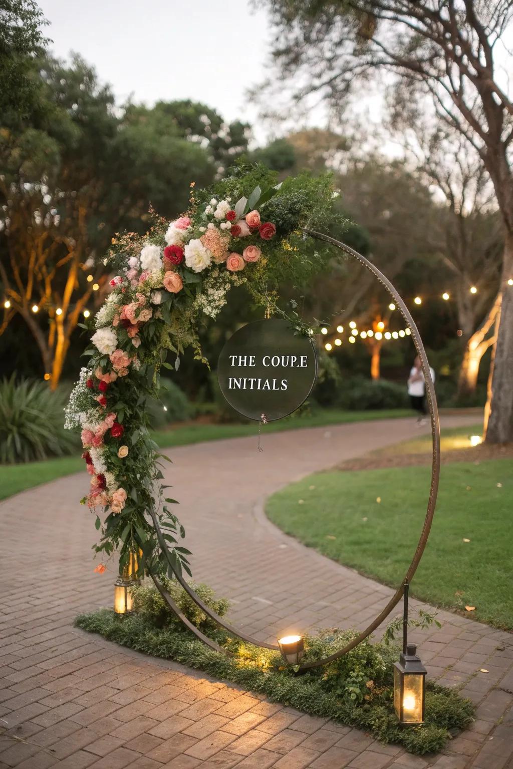 A personalized circular wedding arch showcasing the couple's initials.
