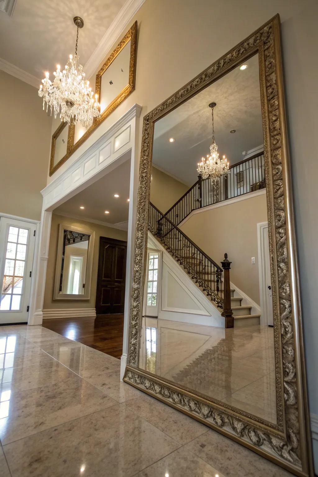 A large mirror adds depth and reflects light across the entryway.