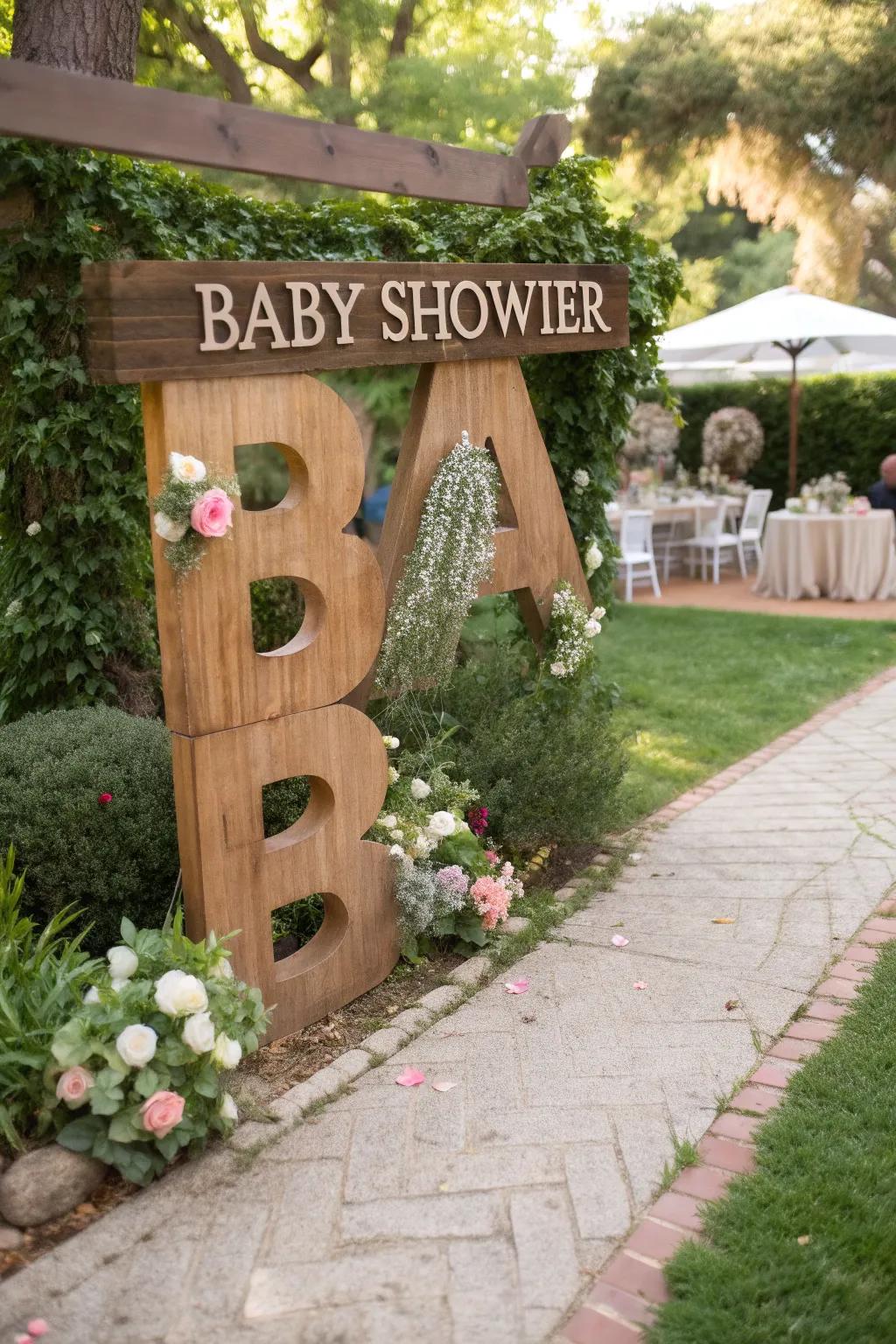 Bespoke emblems beautifully personalize the baby shower’s entrance.
