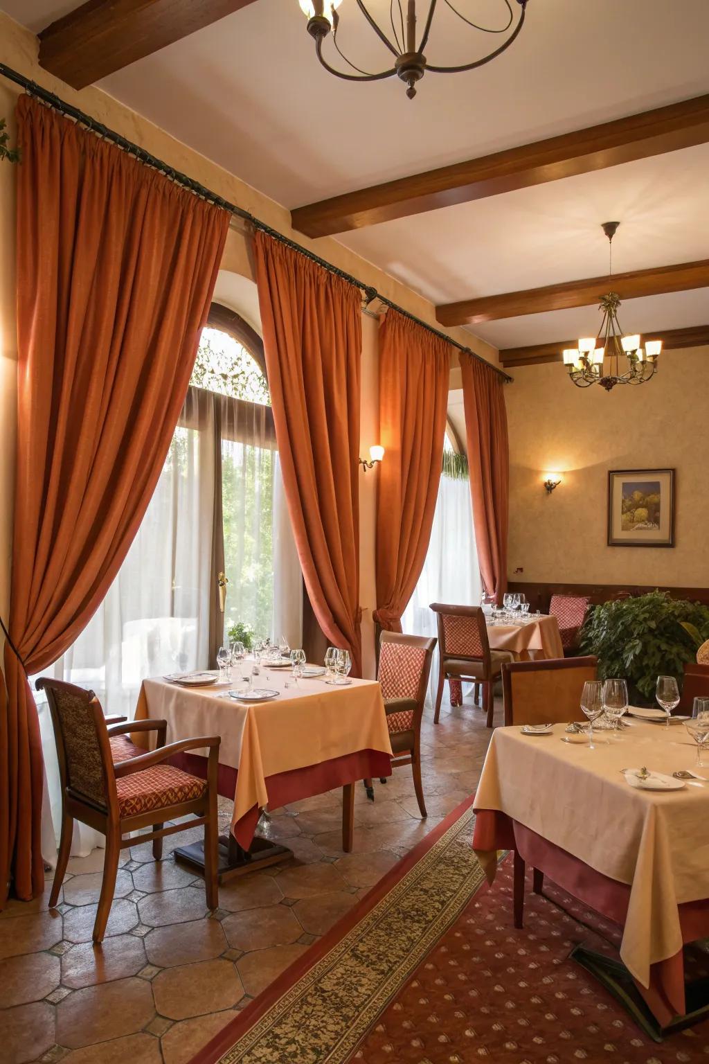 Rust draperies forging a snug and welcoming ambiance in a dining area.