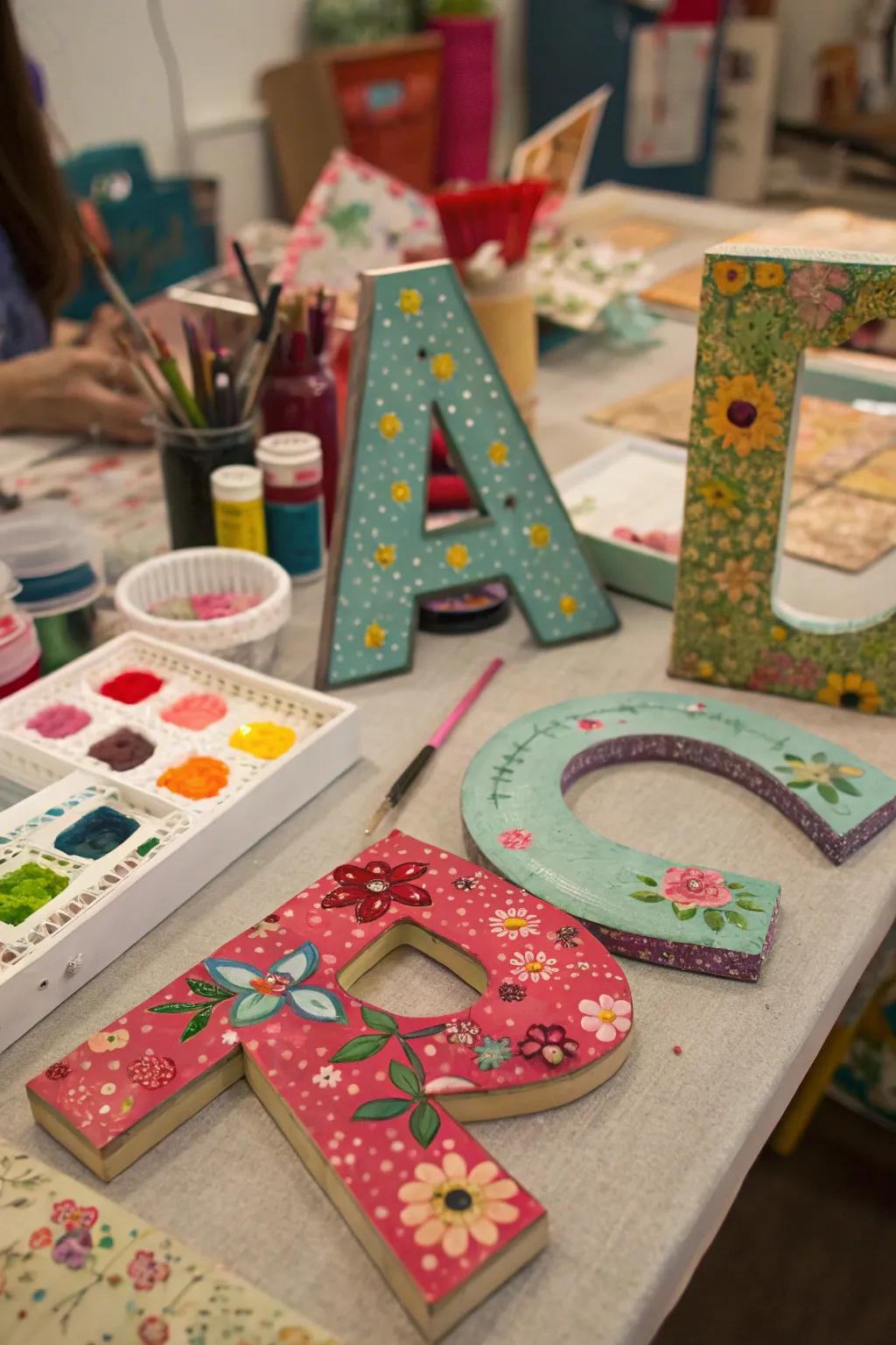 Mixed media letters featuring a variety of textures.