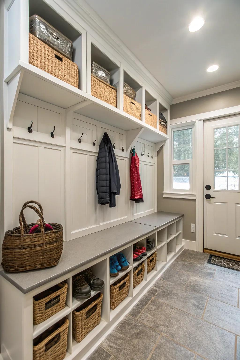 A functional vestibule featuring storage seating and coat pegs, aiding in maintaining the residence organized.