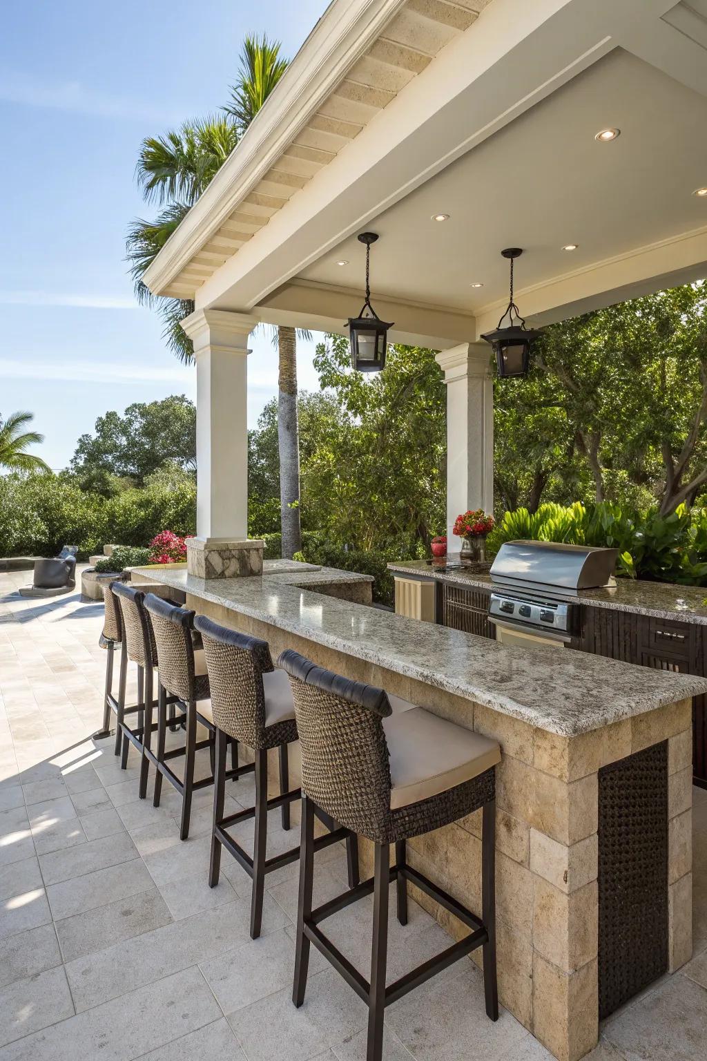 A sophisticated outdoor kitchen bar with granite countertops.