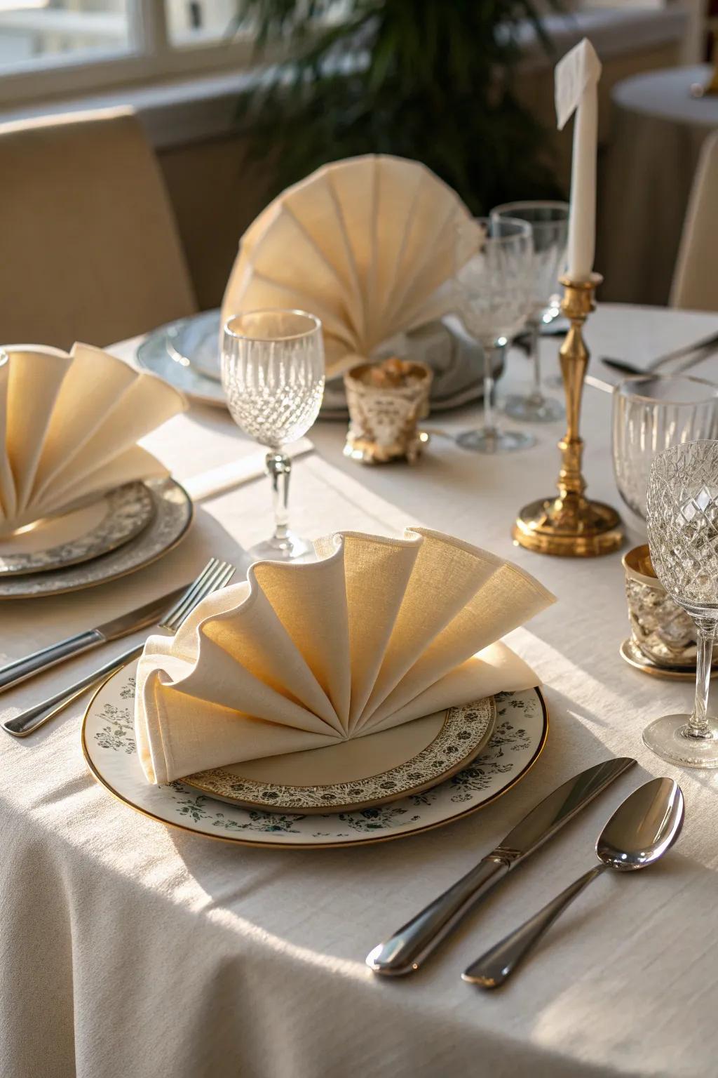 Fan-folded napkins exude timeless elegance at your Thanksgiving feast.