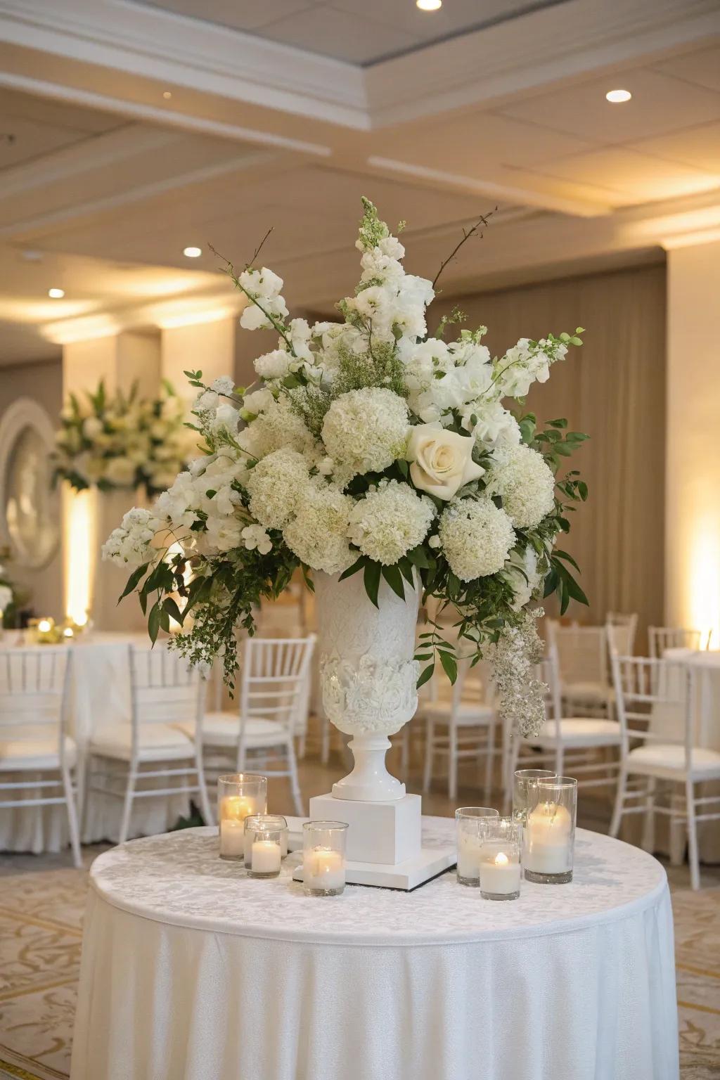 An elegant all-white floral arrangement, providing a timeless and sophisticated touch to the wedding décor.