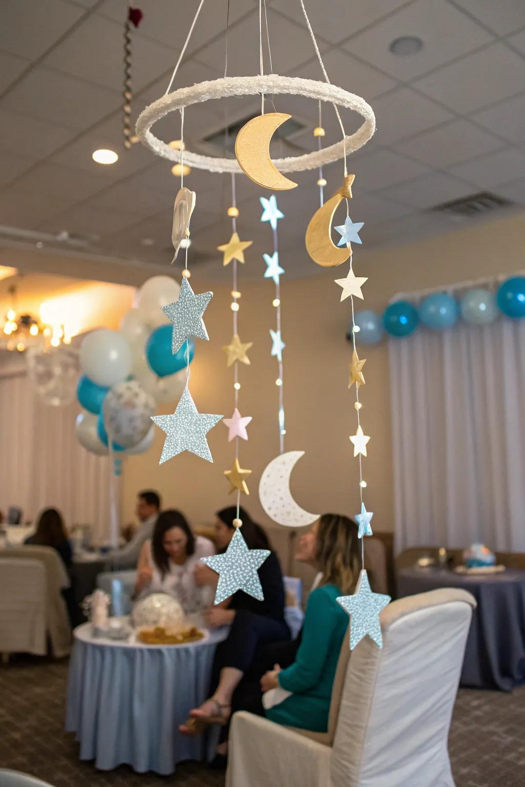 An inventive sculpture with stars and moons adds a magical element to the baby shower d&eacute;cor.
