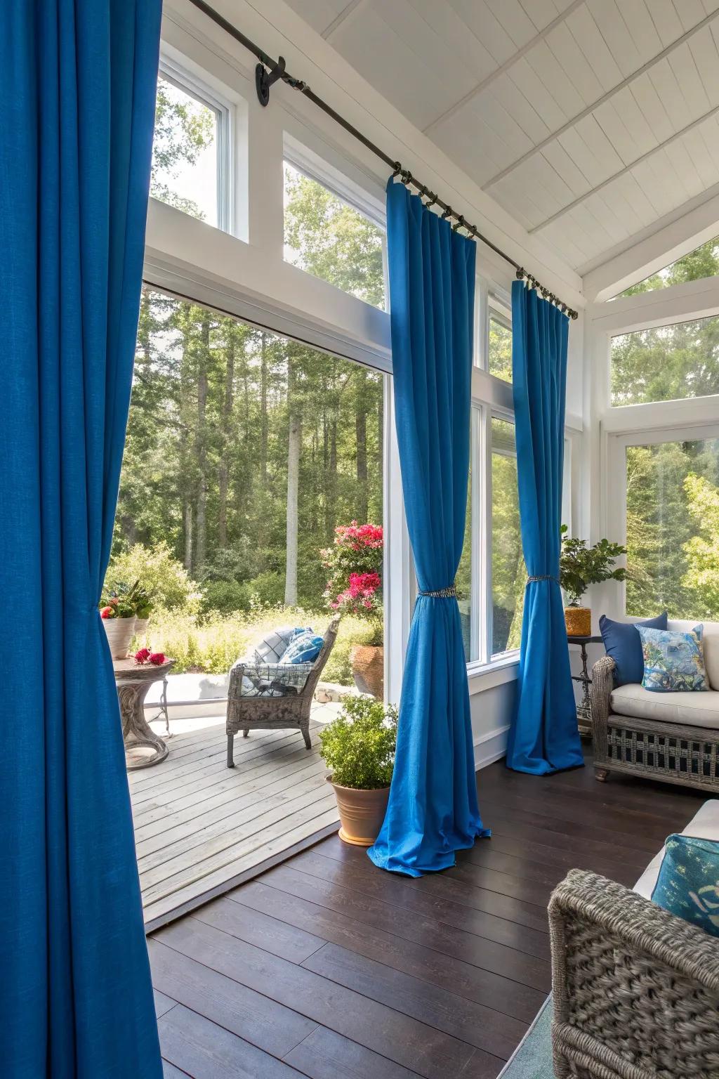 Bold colors in curtains can make a striking statement in your sunroom.