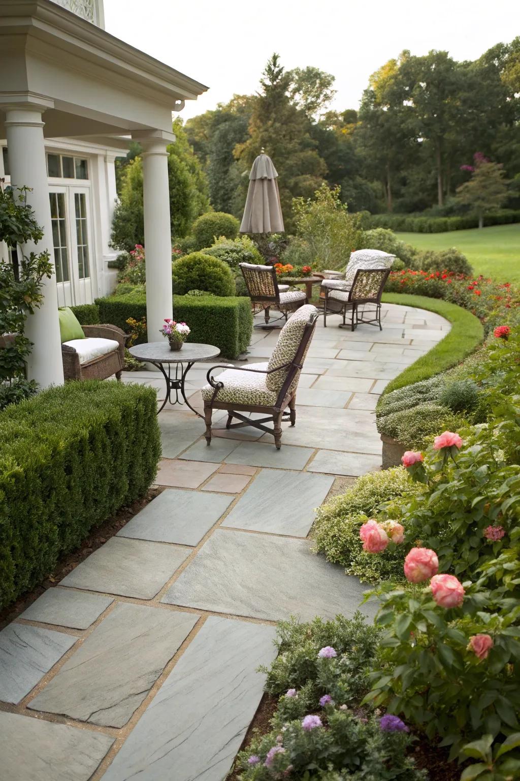 A paving stone pathway seamlessly connecting to a cozy outdoor living area.