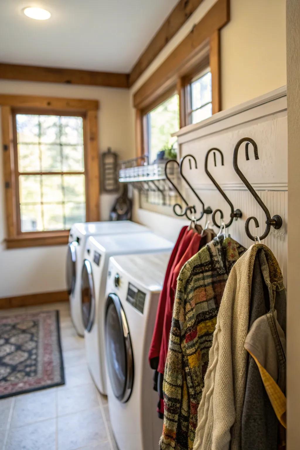 Hooks provide convenient hanging storage in this laundry room.