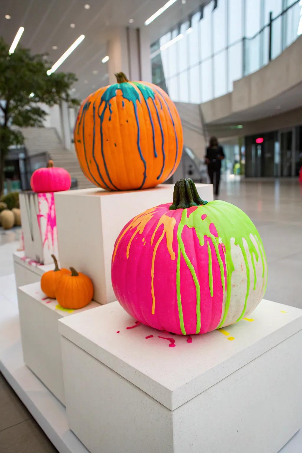 Neon drip pumpkins add a bold, modern touch to fall decorations.