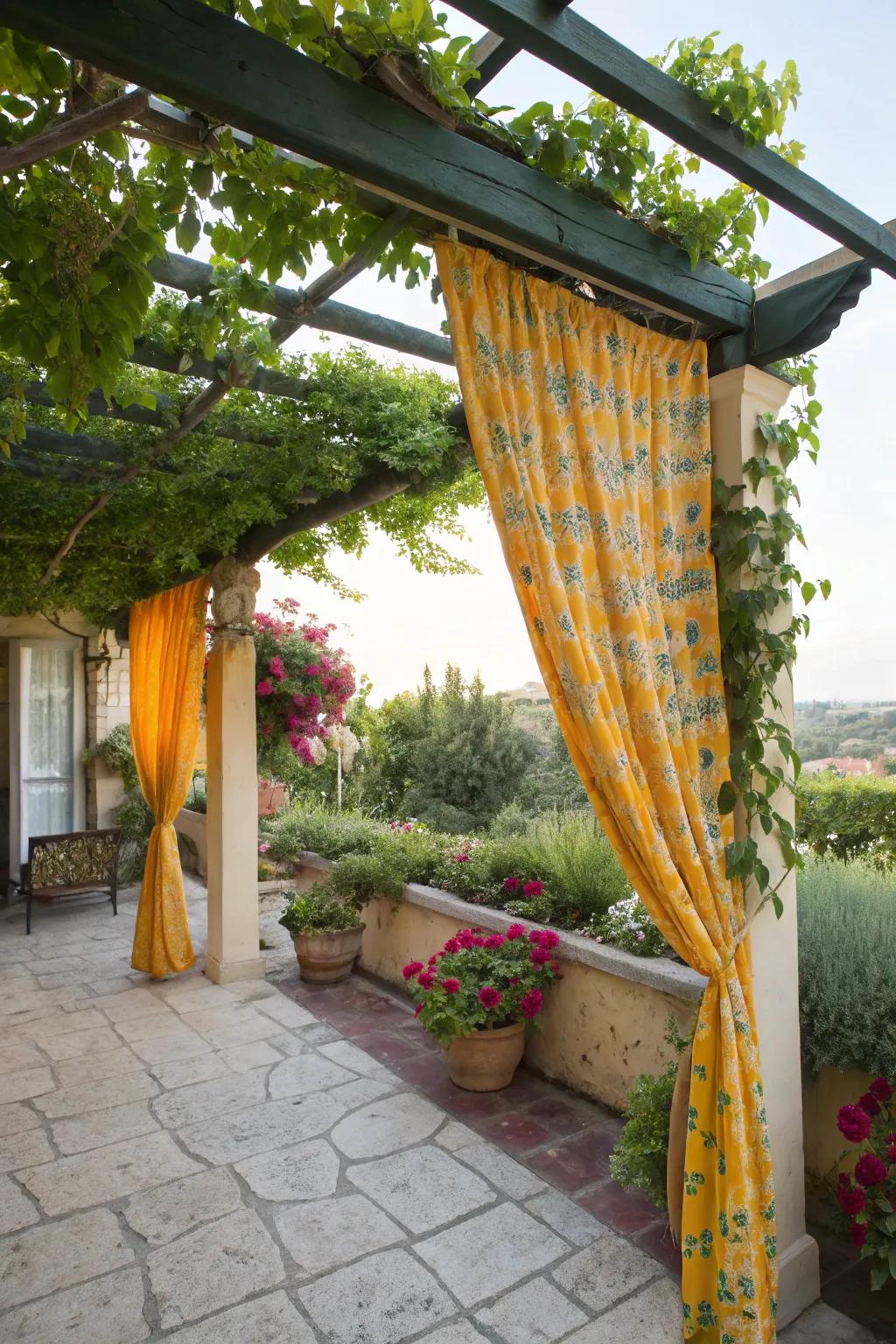 Colorful curtains give a small pergola a lively touch.